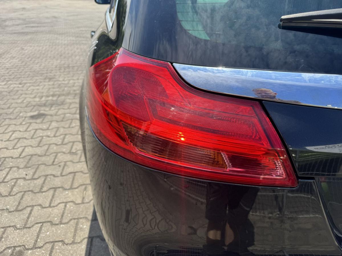 Opel Insignia A original R&uuml;cklicht R&uuml;ckleuchte Schlussleuchte links Kombi Bj.2011