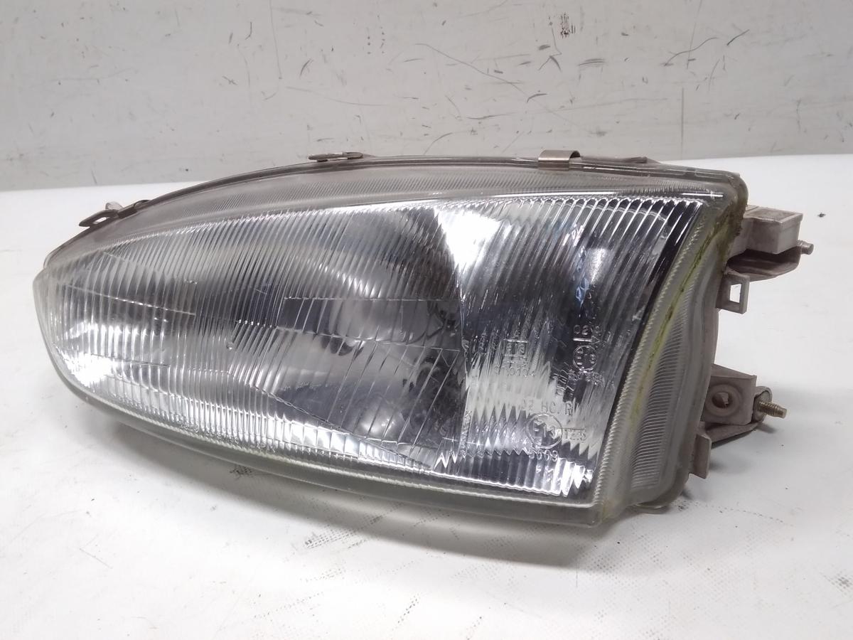 Mitsubishi Colt CJ0 original Scheinwerfer links Halogen mit LWR BJ1996