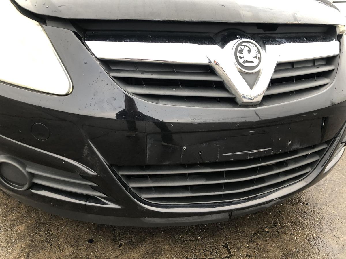 Opel Corsa D Sto&szlig;f&auml;nger vorn Frontsch&uuml;rze mit Vauxhall Grill 2HU Saphirschwarz