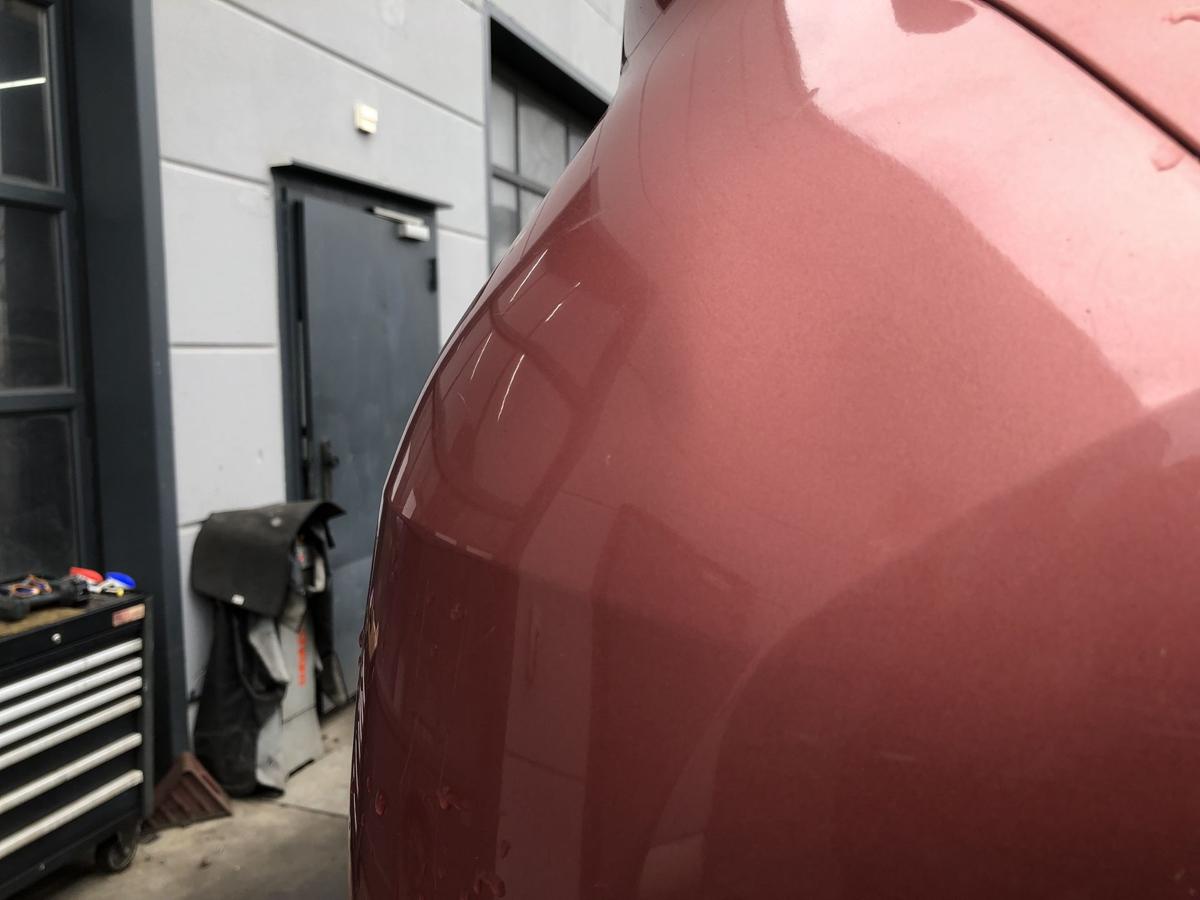 Daihatsu Sirion M300 original Stoßstange Fänger hinten/Heck R43 Korall Bj 2005