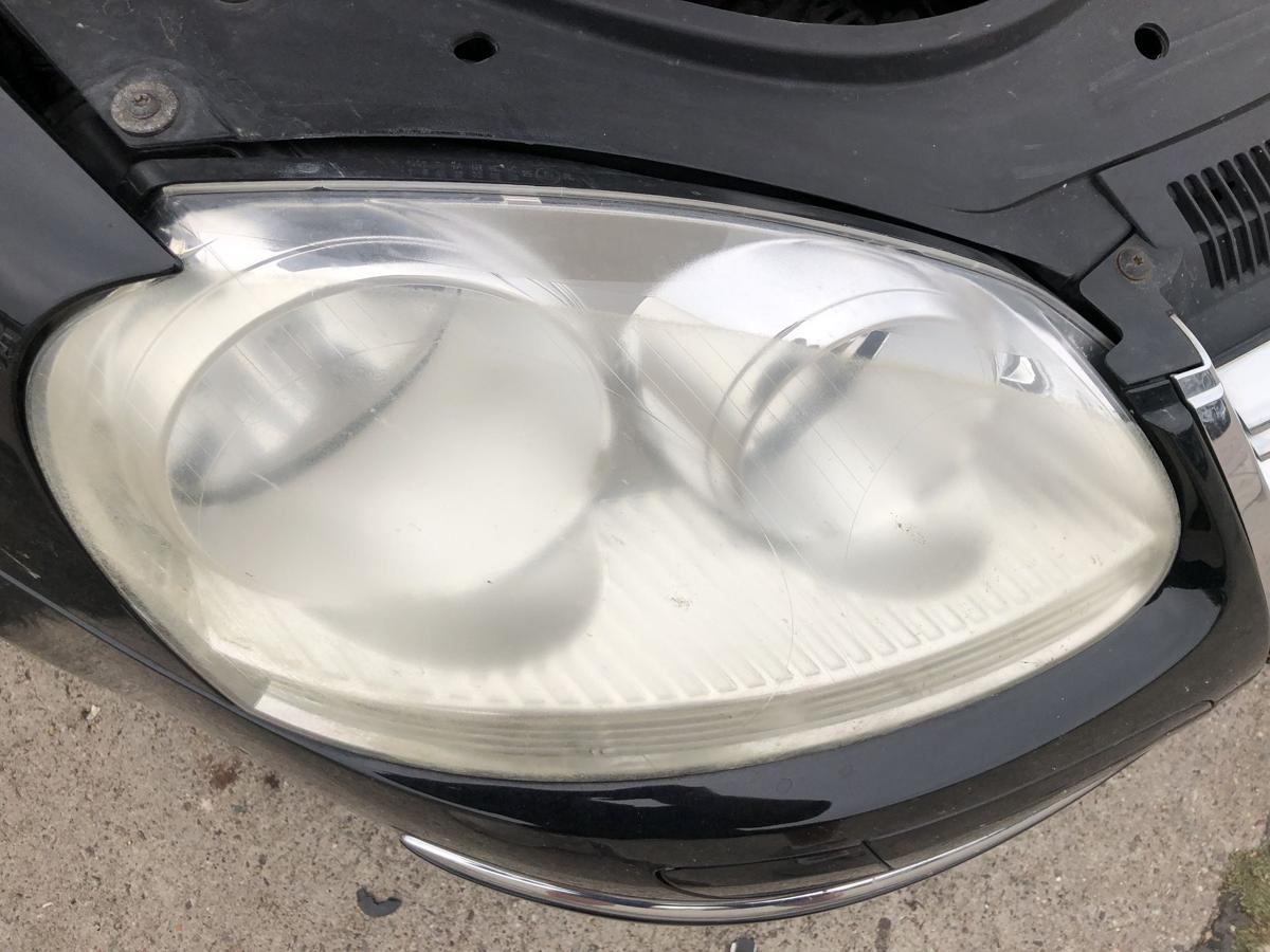 VW Jetta 1K2 Scheinwerfer links Hauptscheinwerfer rechts Hella Trübung Lampe