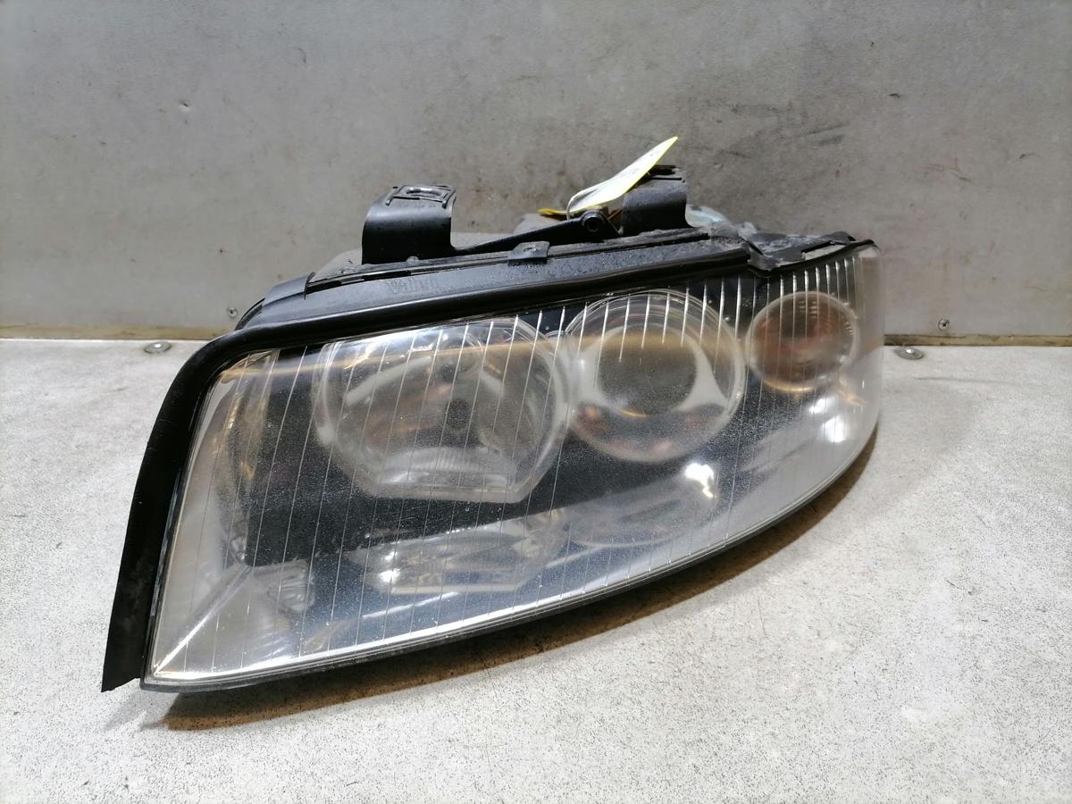 Audi A4 8E B6 original Scheinwerfer vorn links Halogen mit LWR Bj.2003