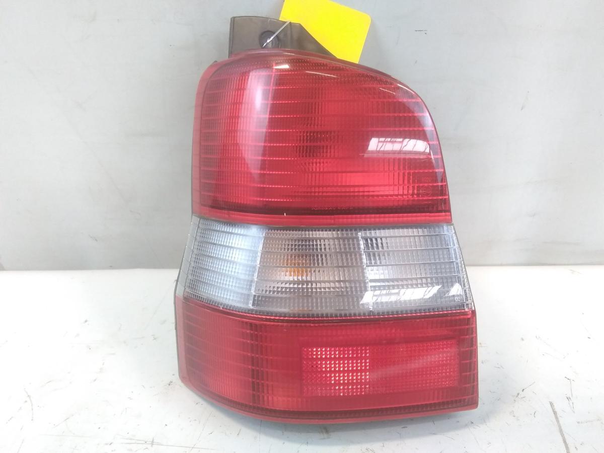 Mazda Demio original Rückleuchte Schlussleuchte links BJ1998