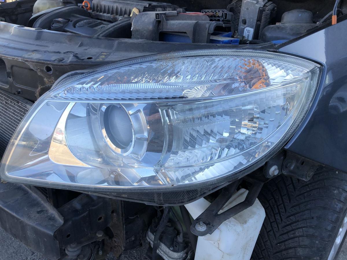 Skoda Fabia 5J Scheinwerfer links Bi Halogen mit Linse Hella bis 2010 OEM