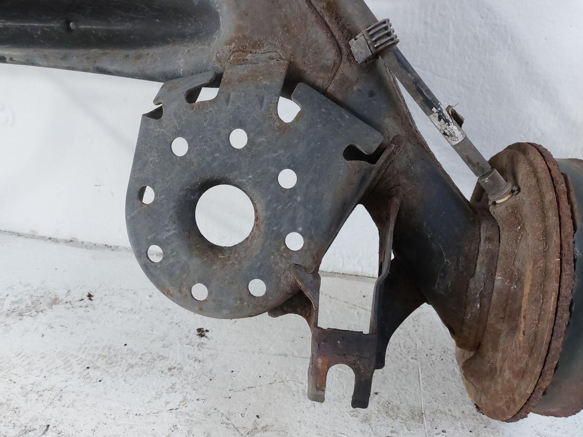 Toyota Yaris XP13 Hinterachse Achse hinten Achsk&ouml;rper mit Trommelbremse und ABS