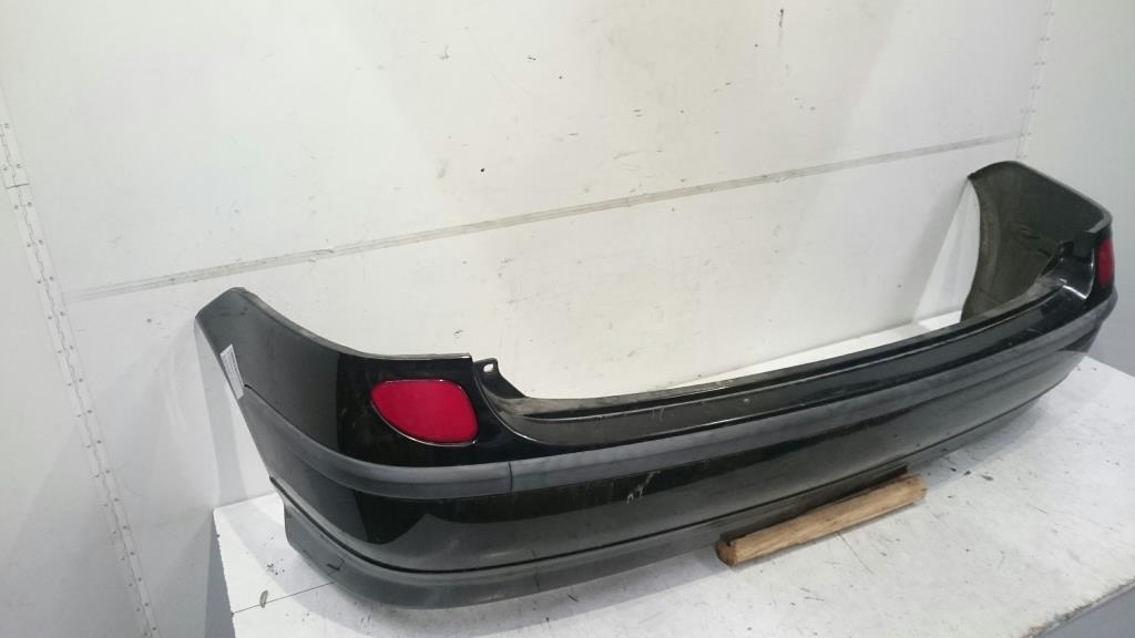 Nissan Almera Tino BJ 2003 Stoßstange hinten Stoßfänger Schwarz 03-06