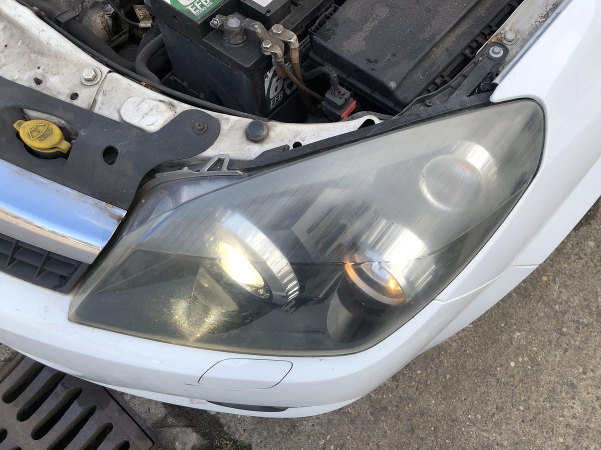 Opel Astra H GTC Scheinwerfer links Xenonscheinwerfer Tr&uuml;b OEM Hella Lampe