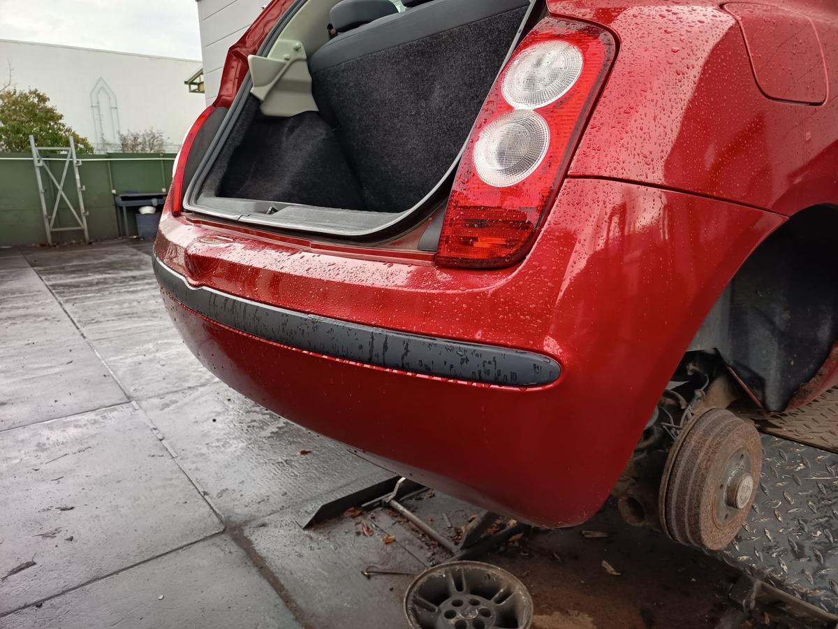 Nissan Micra K12 original Sto&szlig;stange F&auml;nger hinten/Heck A32 Chilirot Bj 2005