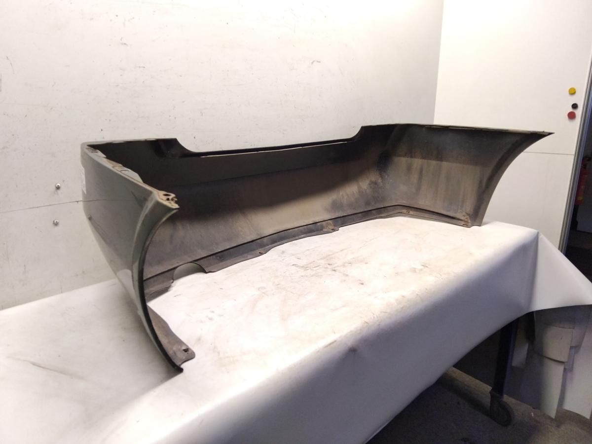 Nissan Primera P12 orig. Sto&szlig;f&auml;nger Sto&szlig;stange hinten Limousine BJ2002 DV9 Gr&uuml;nmetallic