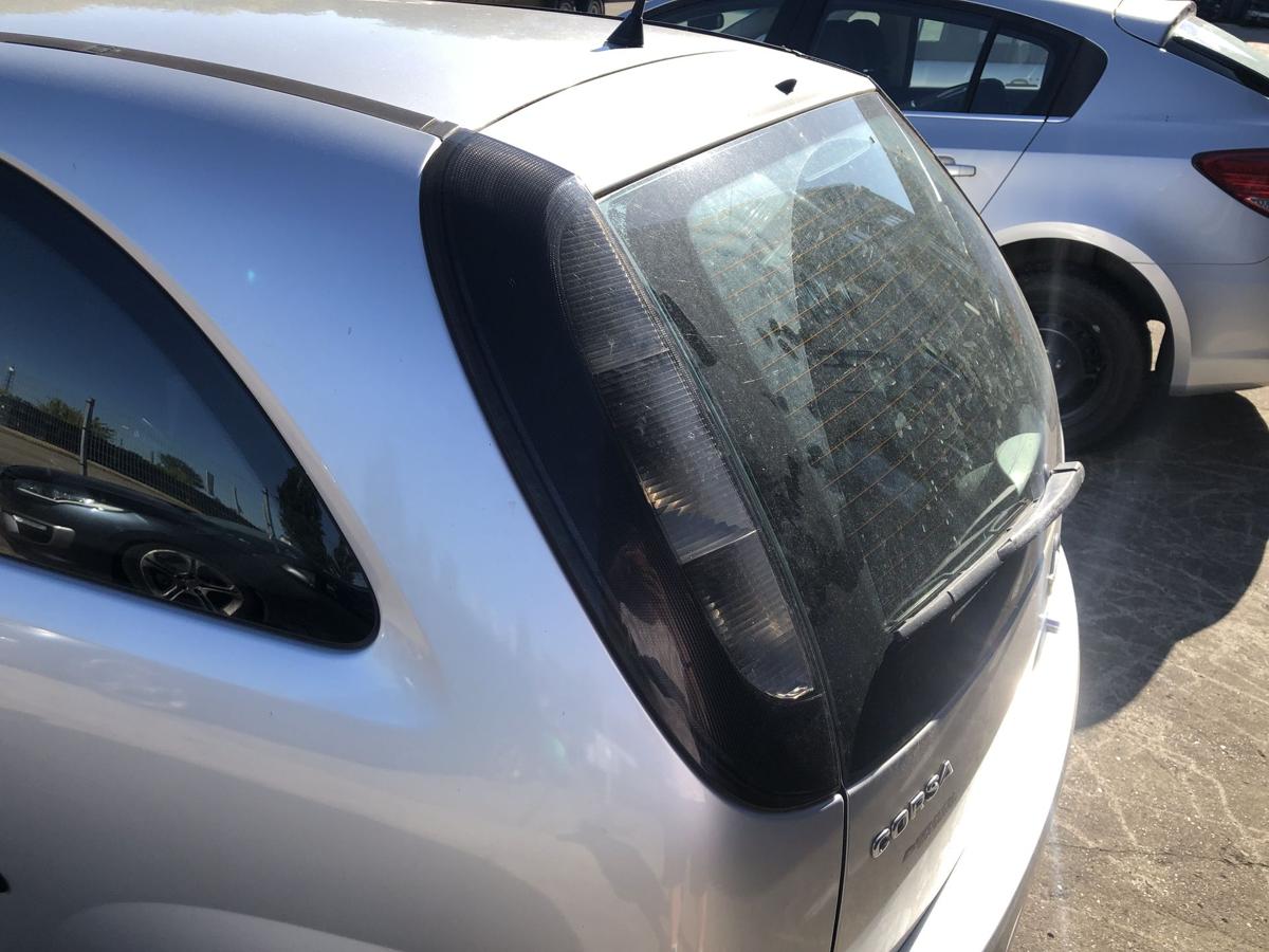 Opel Corsa C ab 2003 Rückleuchte links Rücklicht Heckleuchte dunkel getönt