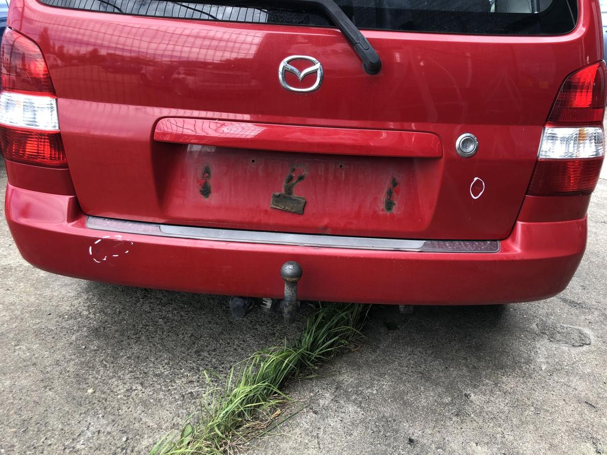 Mazda Demio DW Sto&szlig;f&auml;nger hinten Hecksch&uuml;rze Sto&szlig;stange Heck rot AHK Ausschnitt