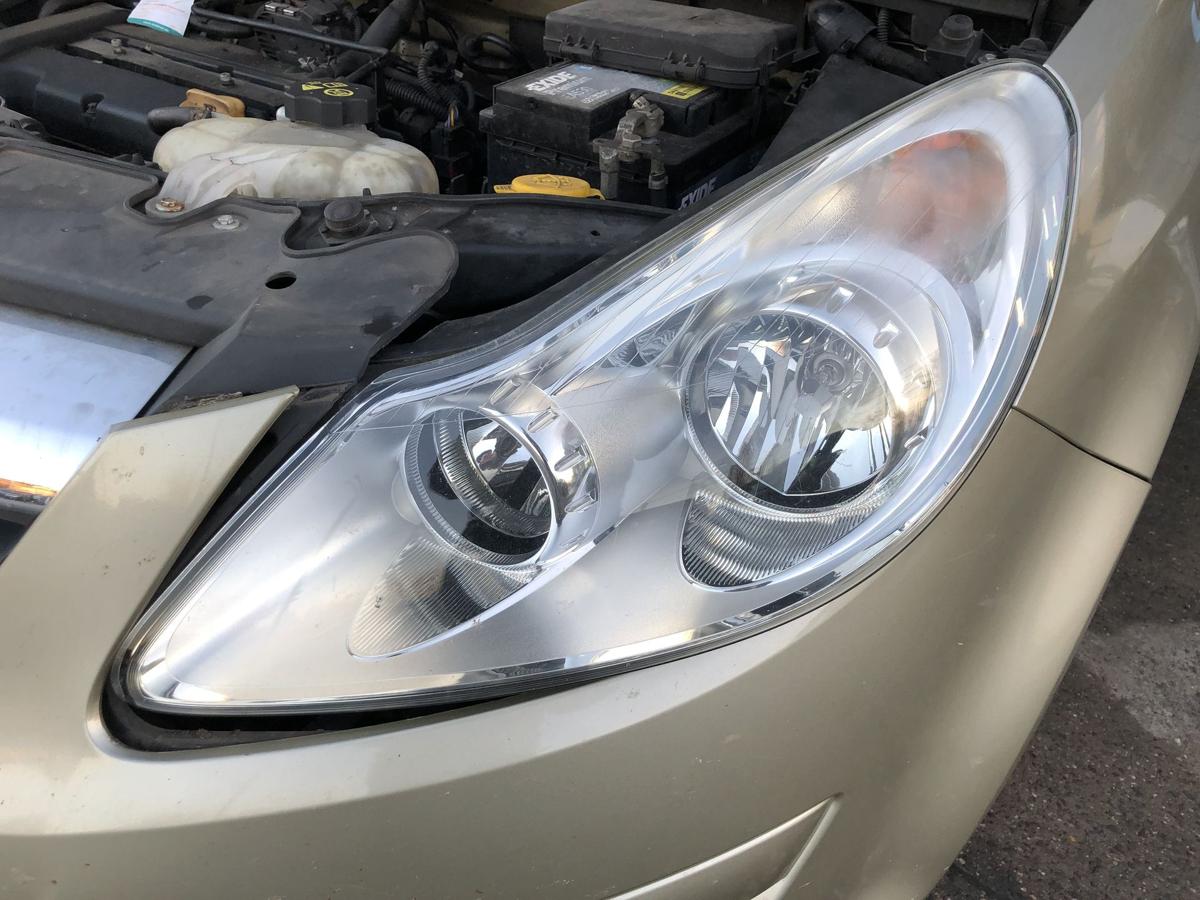 Opel Corsa D Scheinwerfer links Lampe Halogen OEM Frontscheinwerfer