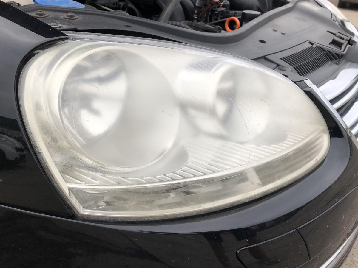 VW Jetta 1K2 Scheinwerfer links Hauptscheinwerfer rechts Hella Trübung Lampe