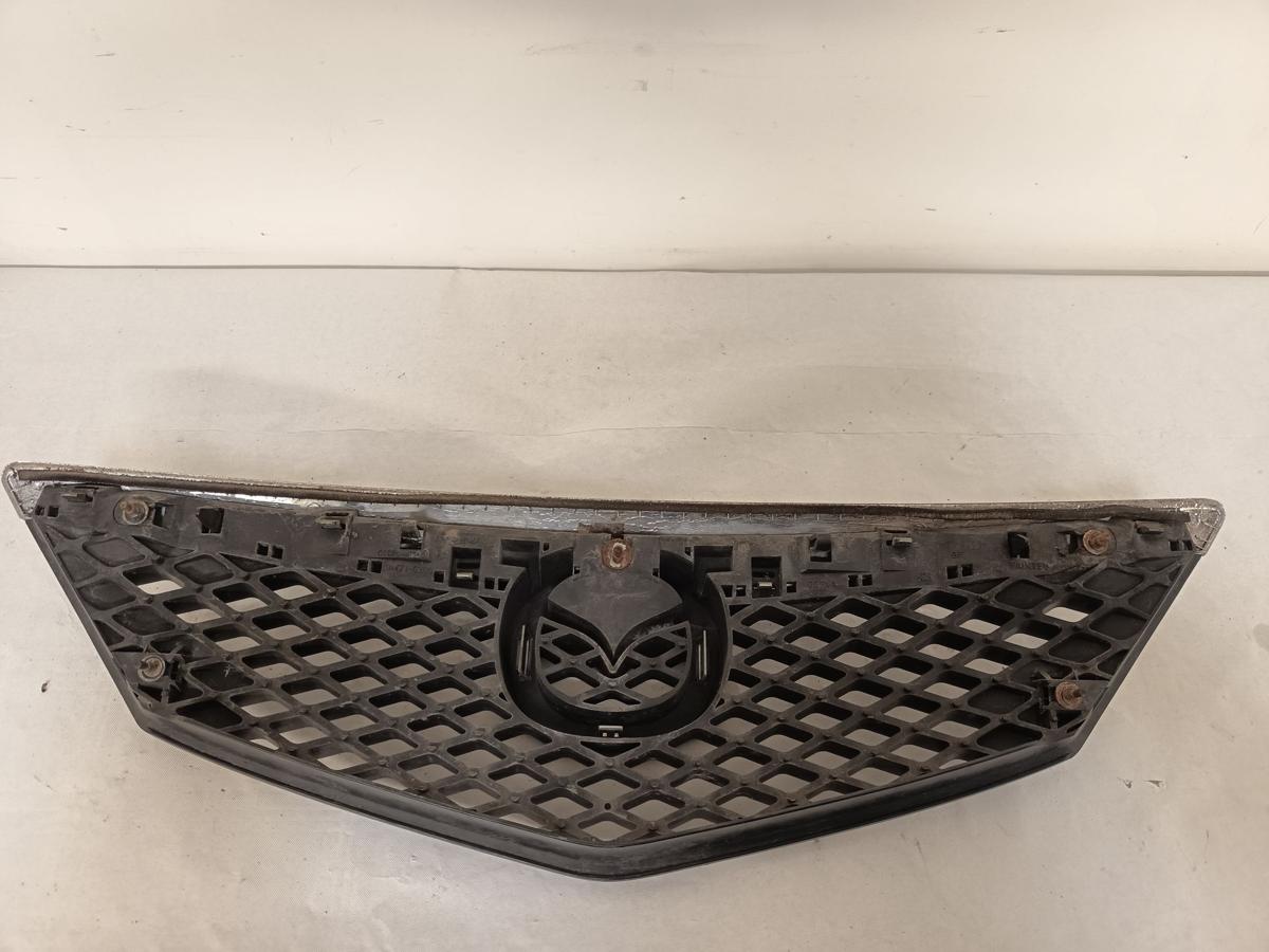 Mazda 2 DY Bj 2005 original Kühlergrill Grill mit Emblem