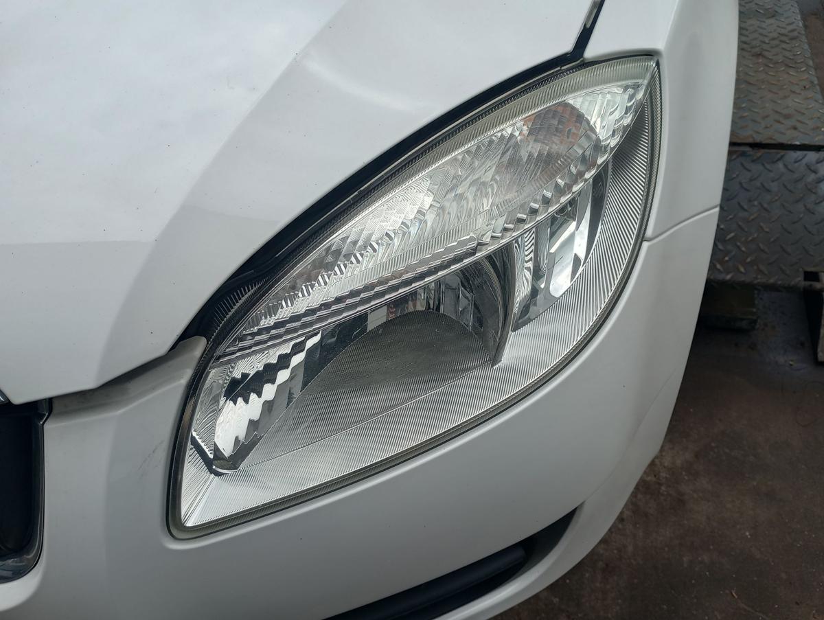 Skoda Roomster 5J orig Scheinwerfer links Halogen Bj 2009