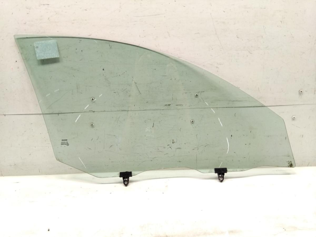 Nissan Primera P12 original T&uuml;rscheibe vorn links gr&uuml;ncolor BJ2002