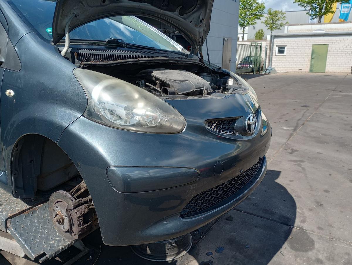 Toyota Aygo 1 orig Stoßstange Stossfänger vorn 1E0 Rauchgrau mica Bj 2005