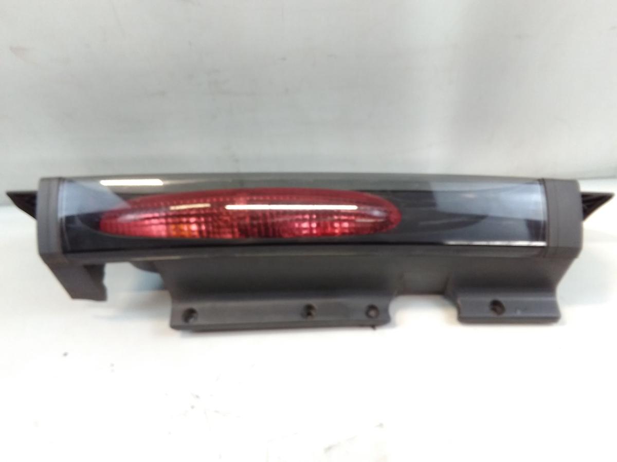 Opel Vivaro A original Rückleuchte Schlussleuchte links mit Blende BJ2003