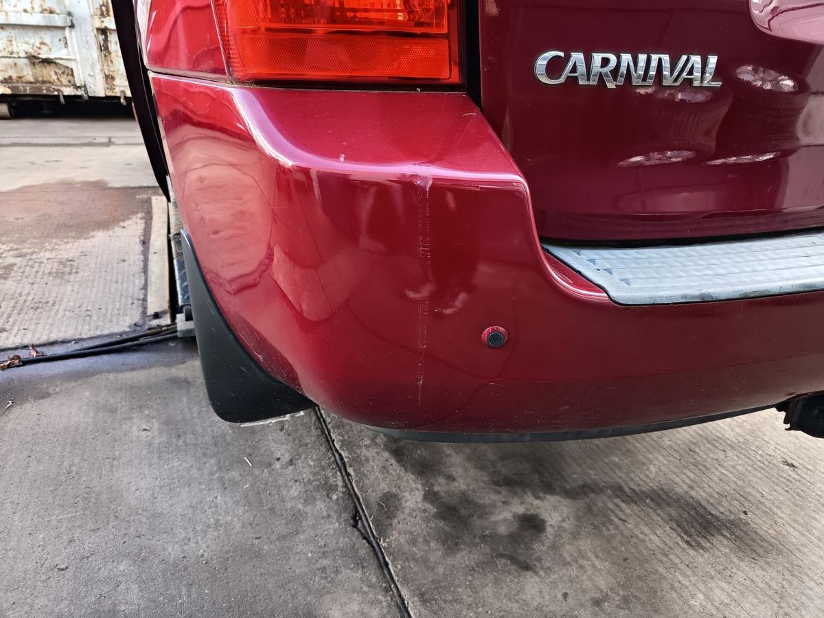 Kia Carnival III original Sto&szlig;stange hinten PDC R9 Rubinrot Bj 2006