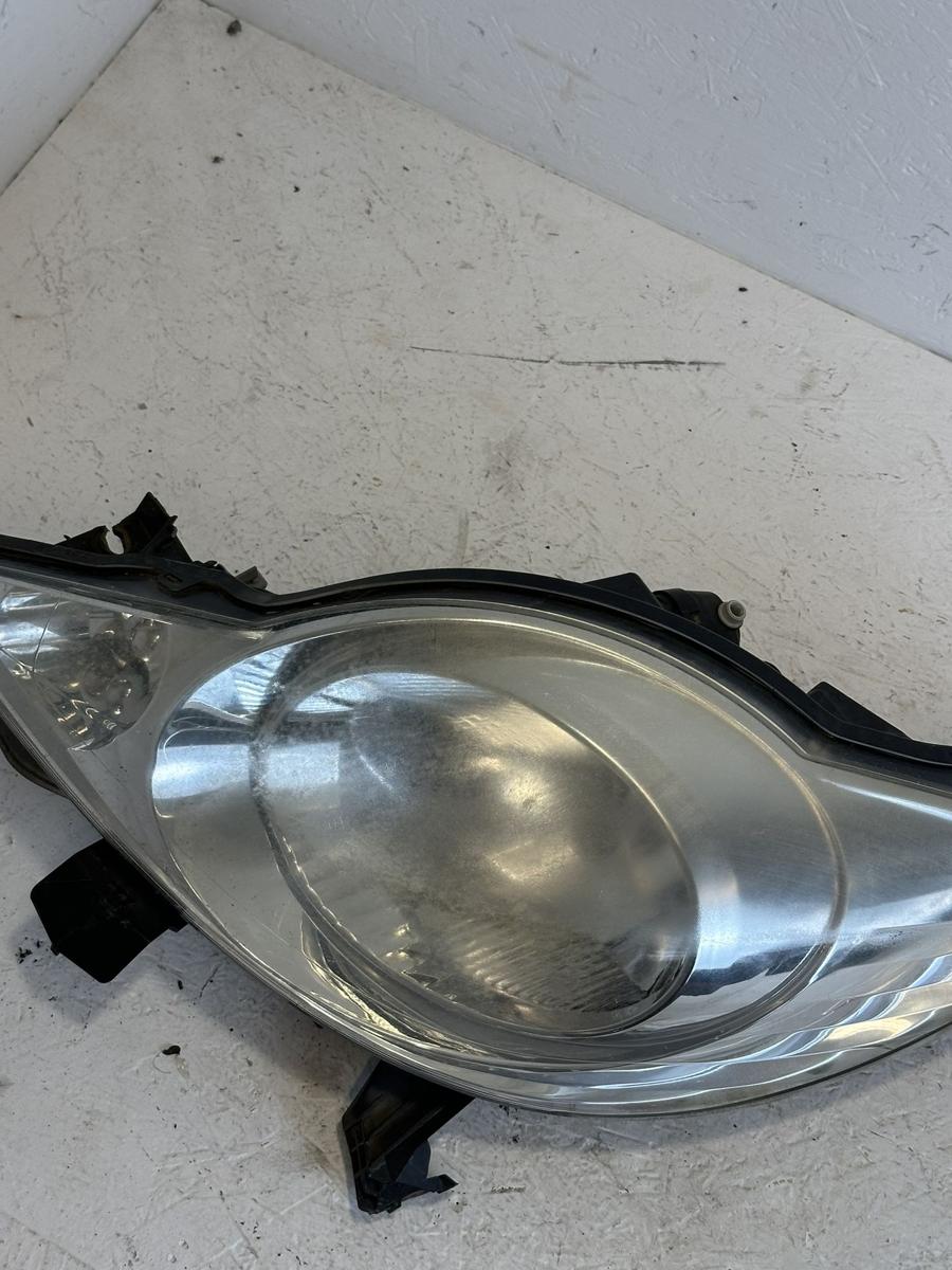 Peugeot 107 Typ P Scheinwerfer links Hauptscheinwerfer Lampe Trübung Valeo OE