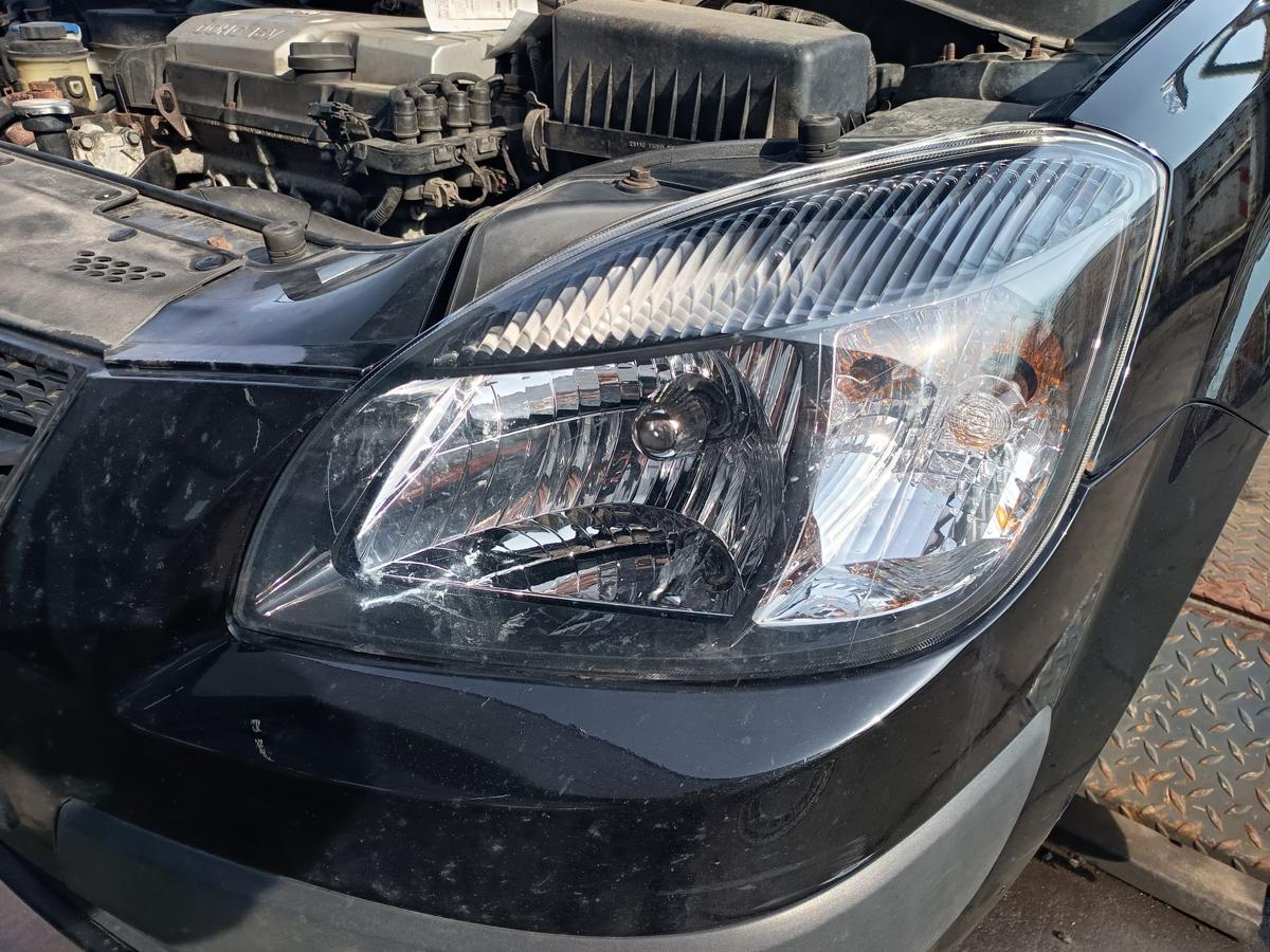 Kia Rio II original Scheinwerfer links Halogen Haupt Licht Front Bj 2009