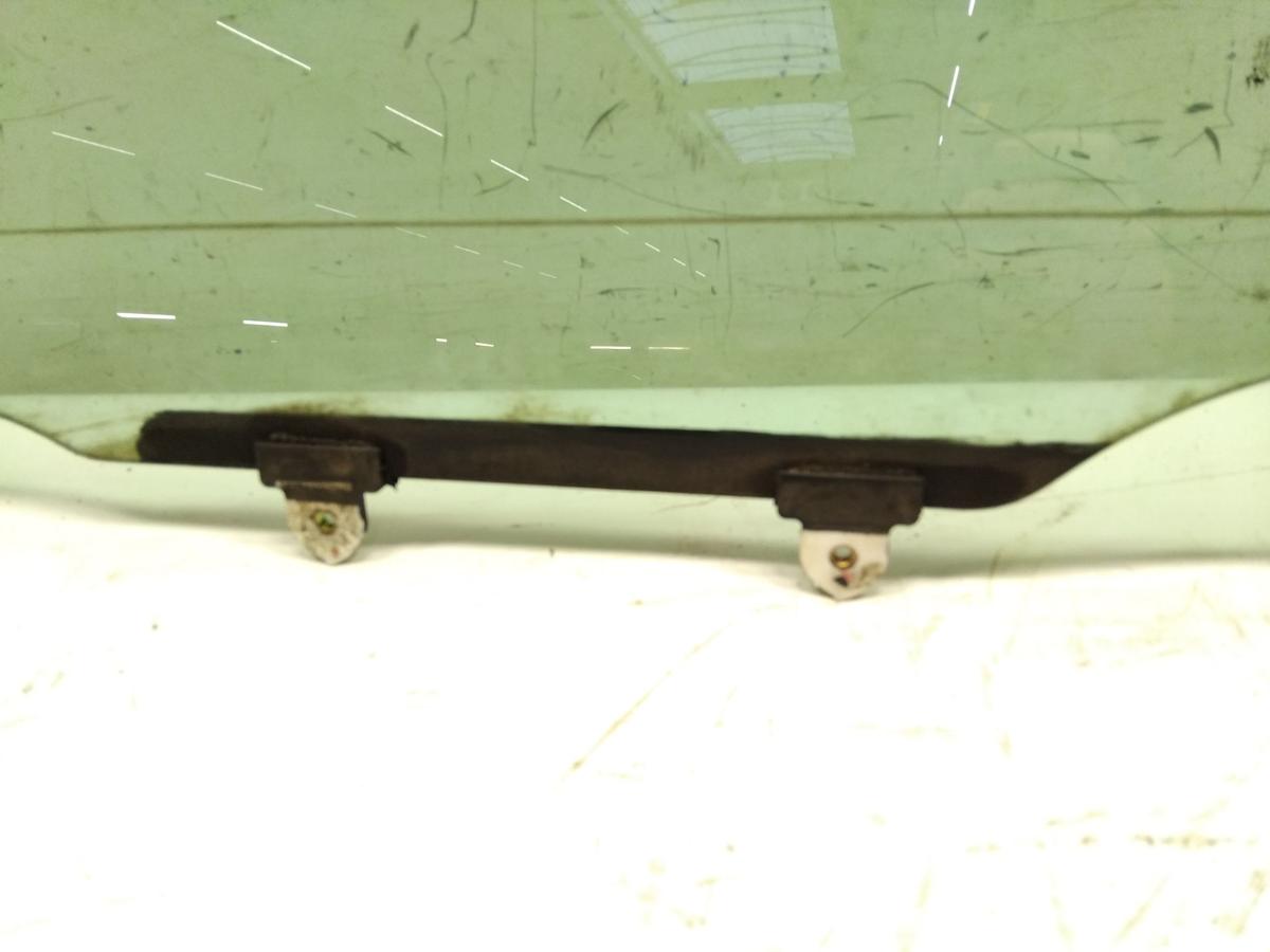 Toyota Avensis T22 original T&uuml;rscheibe vorn links gr&uuml;ncolor BJ2002