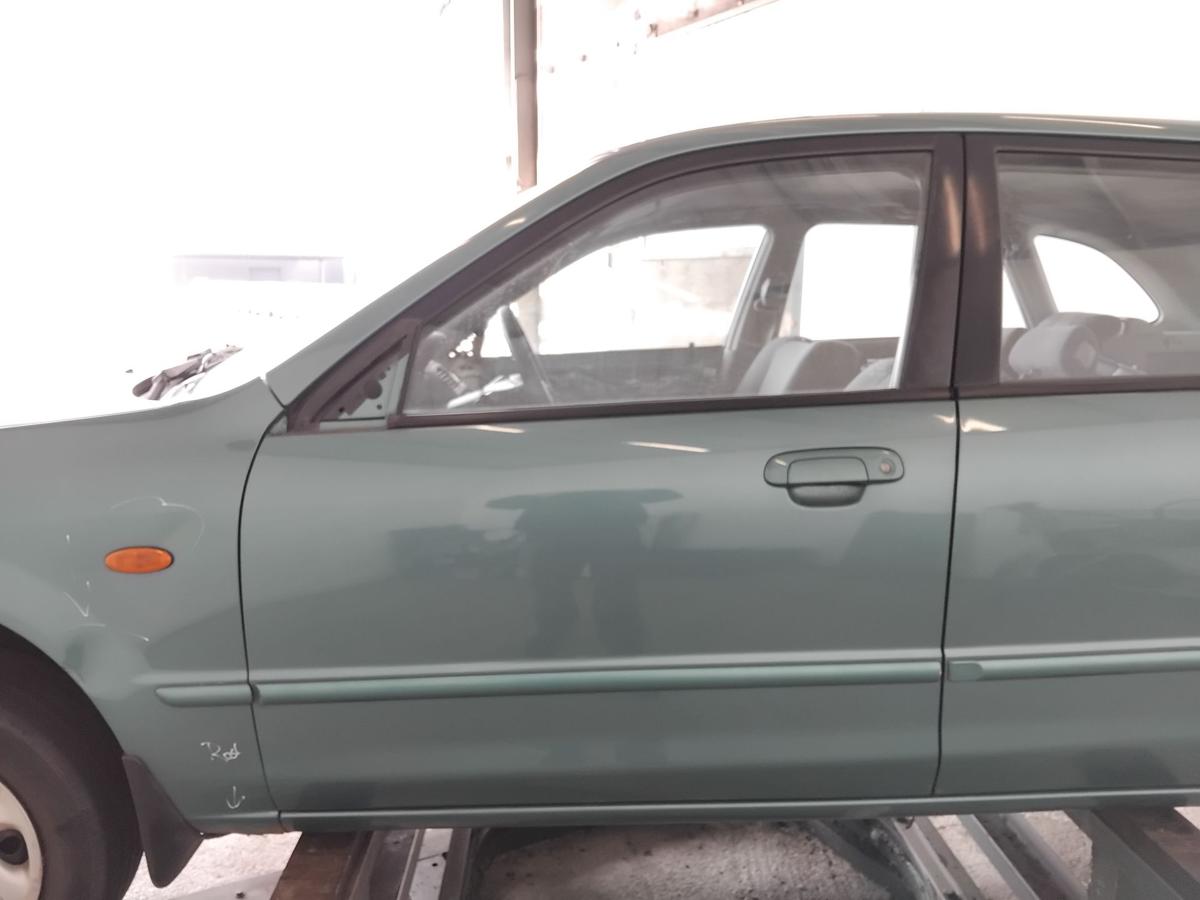 Mazda 323 BJ T&uuml;r vorn links Fahrert&uuml;r 23G orient green pearl BJ2001 5-t&uuml;rig