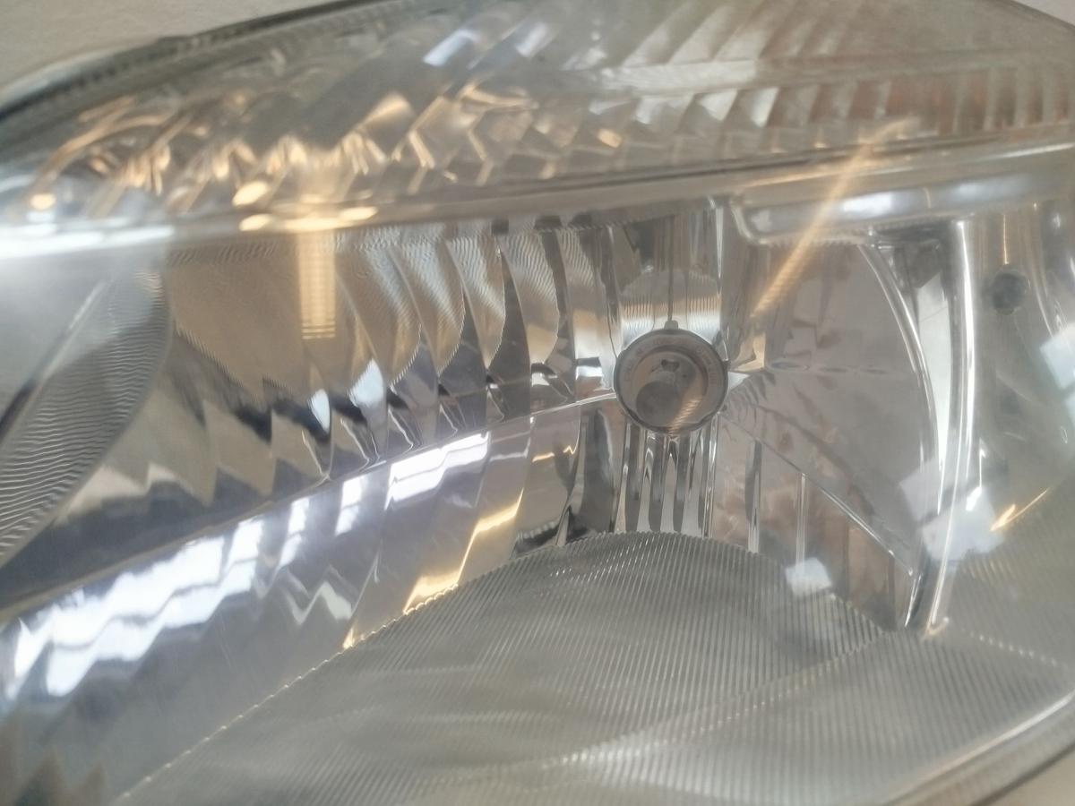 Skoda Roomster Fabia 2 Scheinwerfer links Halogen H4 Hella OE Hauptscheinwerfer