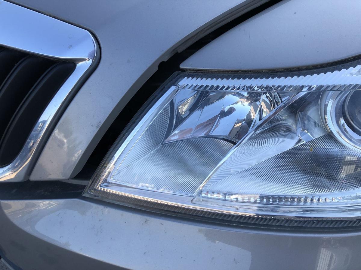 Skoda Octavia 1Z ab09 Scheinwerfer links Hauptscheinwerfer Halogen Hella