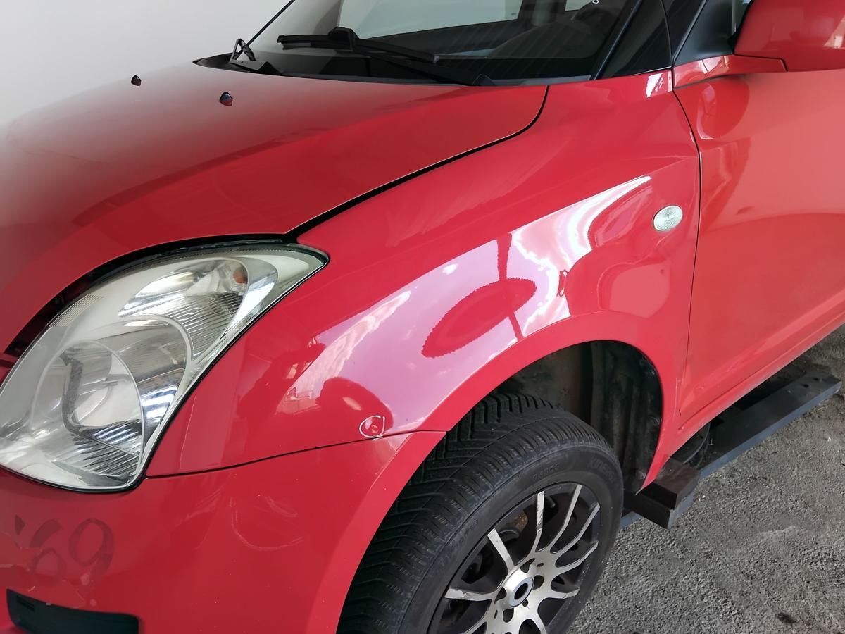 Suzuki Swift 4 MZ original Kotfl&uuml;gel vorn links ZCF Bright Red 5 BJ2008