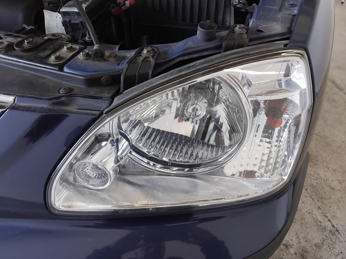 Kia Carens II original Scheinwerfer links Halogen mit LWR BJ2002