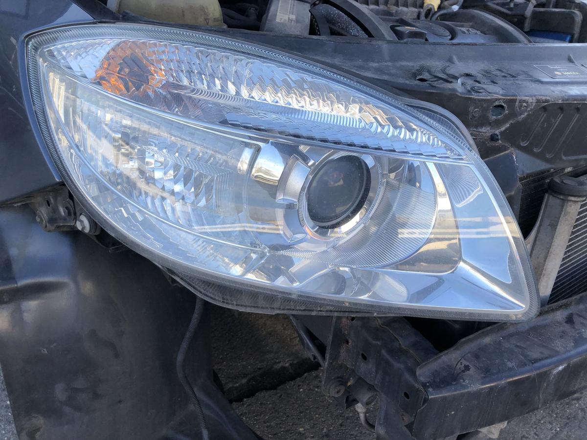 Skoda Fabia 5J Scheinwerfer rechts Bi Halogen mit Linse Hella bis 2010 OEM