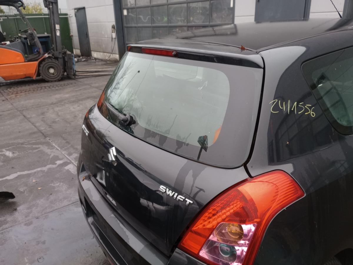 Suzuki Swift IV Heckklappe mit Scheibe Deckel hinten ZCE Cosmic Black Bj 2010