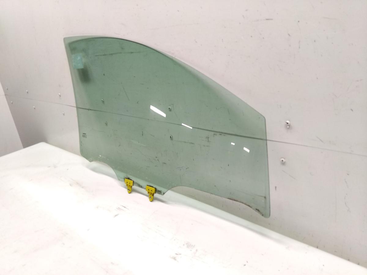 Nissan Note E11 original T&uuml;rscheibe vorn links BJ2006