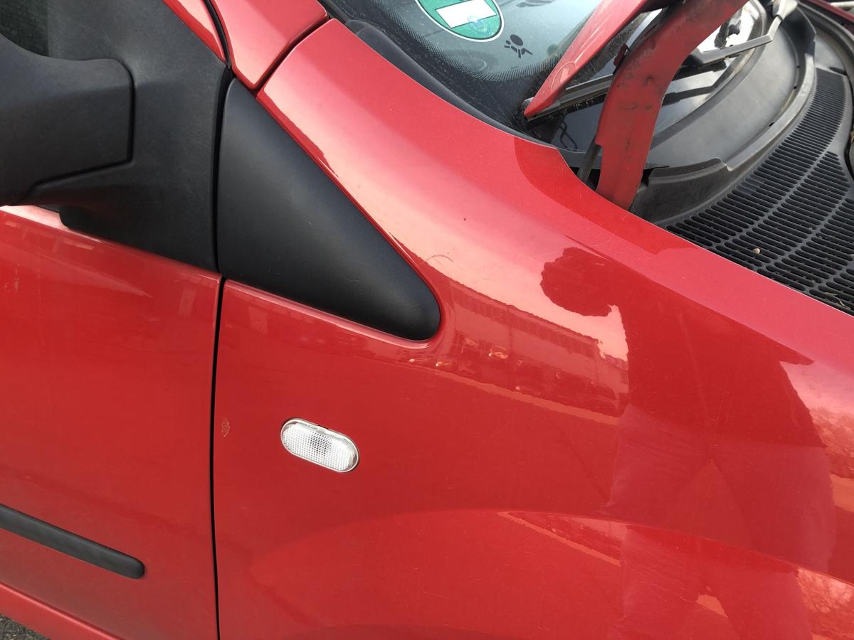 Renault Twingo 2 II Kotfl&uuml;gel vorn rechts Beifahrerseite Plastik OV727 rot