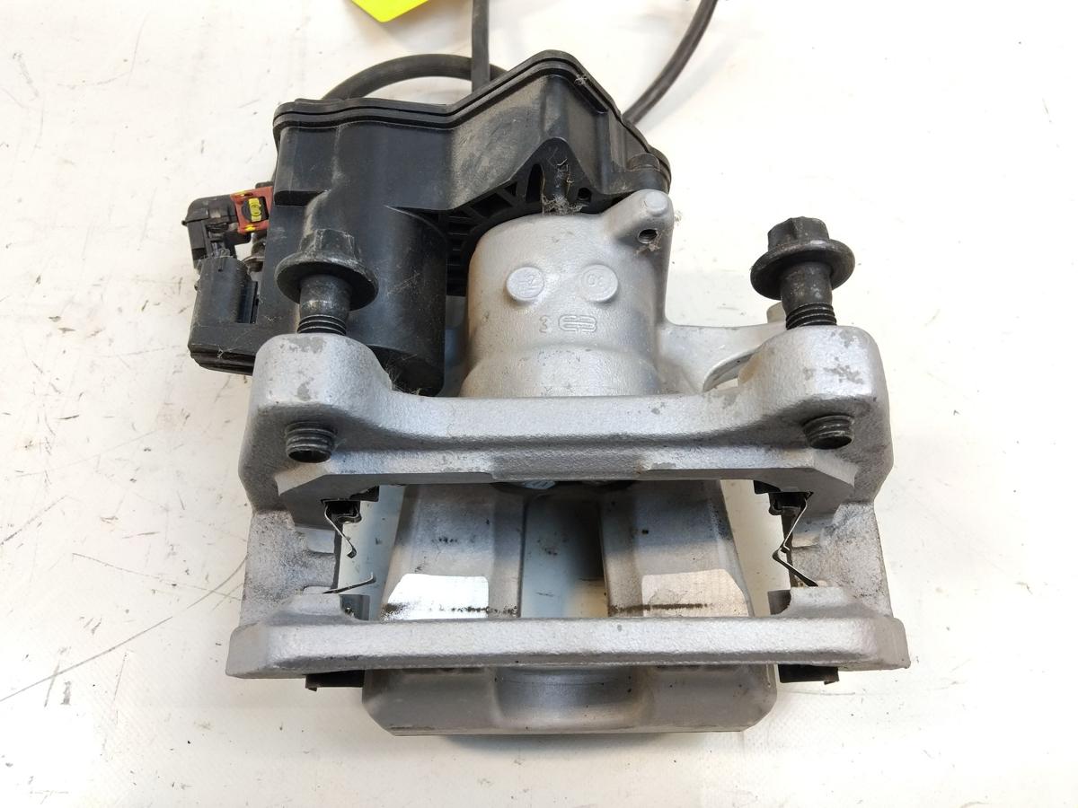 Tesla Model Y original Bremssattel Hinterachse rechts Mando 1044628-00-A Bj.2023
