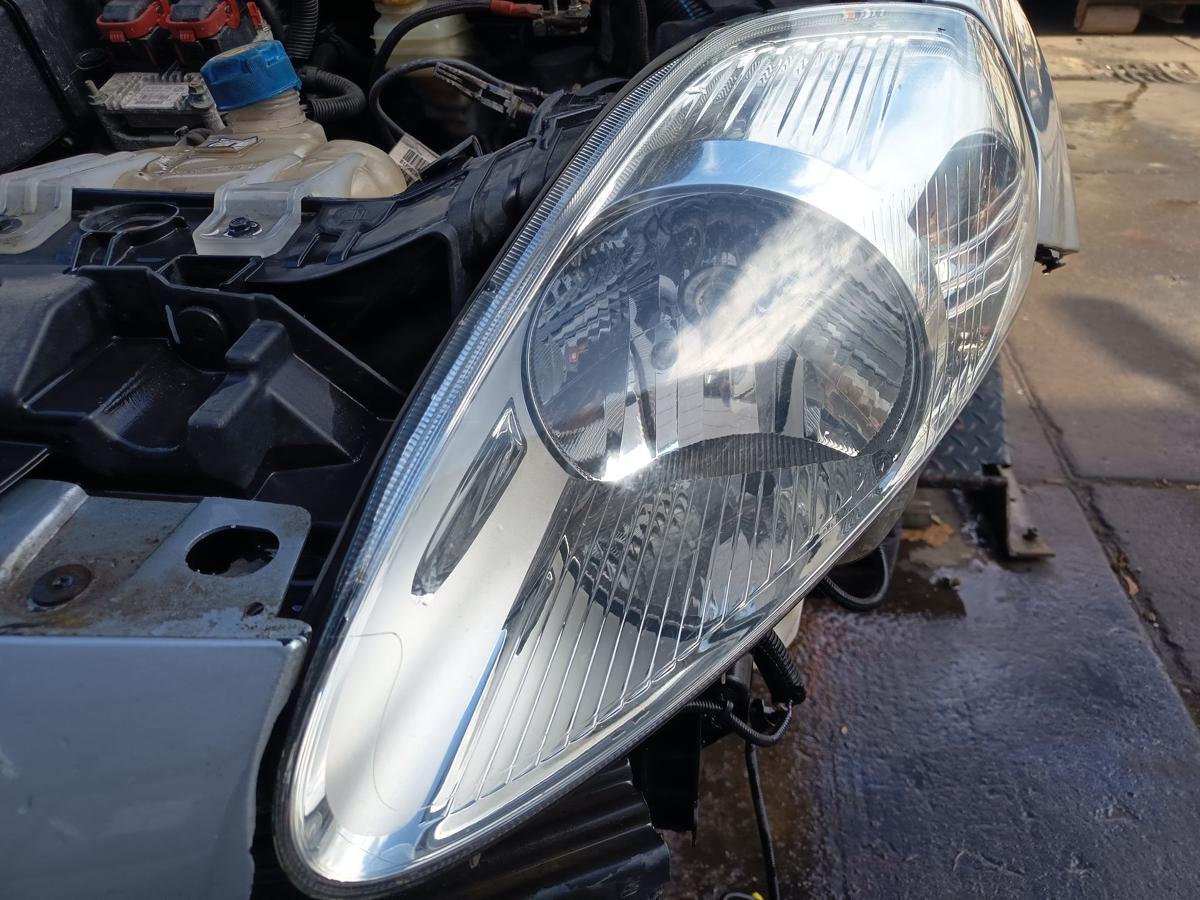 Fiat Grande Punto 199 original Scheinwerfer links Halogen Haupt Front Bj 2009