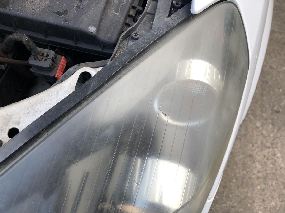 Opel Astra H GTC Scheinwerfer links Xenonscheinwerfer Tr&uuml;b OEM Hella Lampe