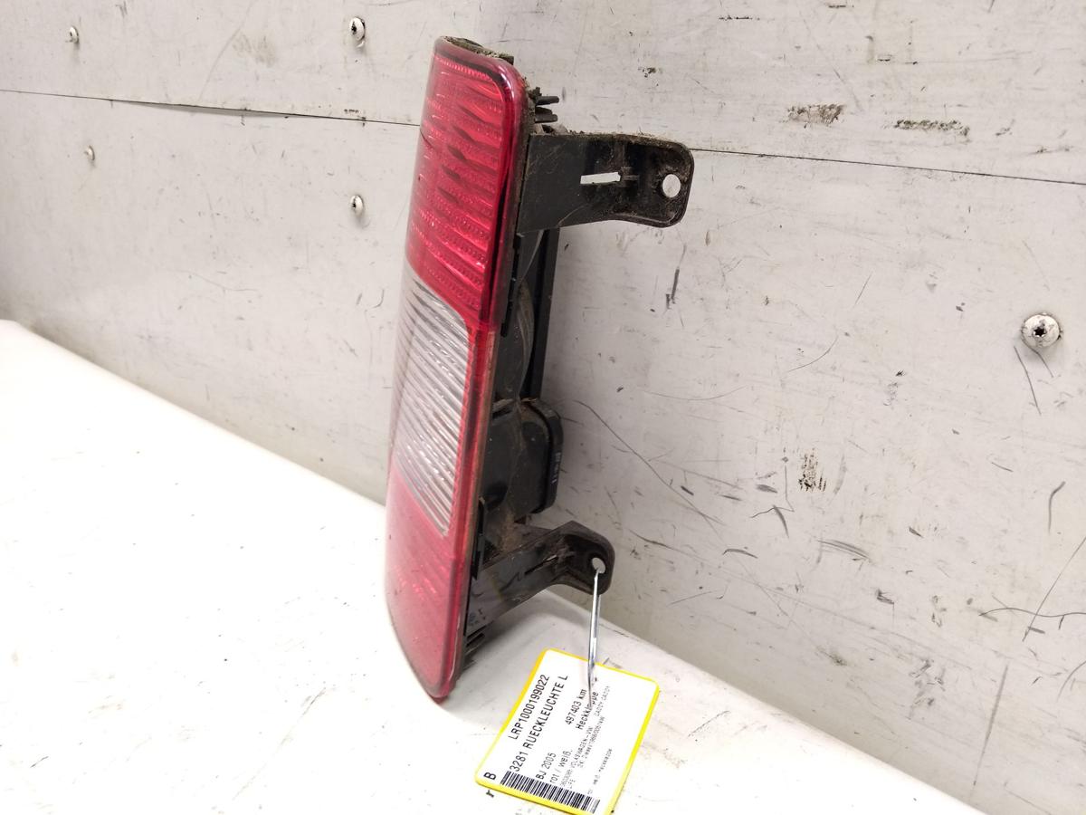 VW Caddy 2K original R&uuml;ckleuchte Schlussleuchte links Heckklappe BJ2005