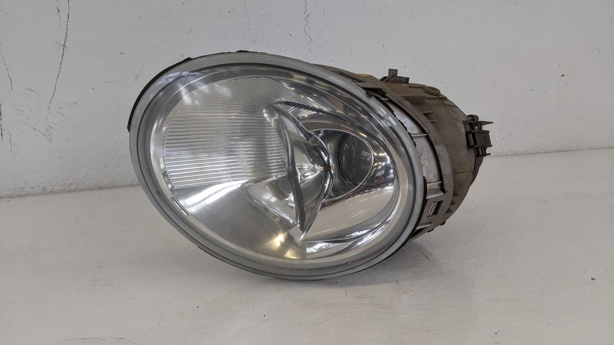 VW New Beetle 9C Scheinwerfer Lampe vorn links Haupscheinwerfer Kratzer