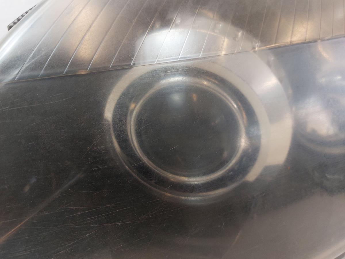 Opel Astra H GTC Scheinwerfer links Xenonscheinwerfer Tr&uuml;b OEM Hella Lampe