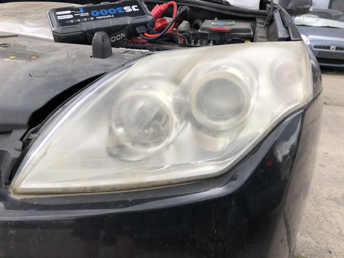 Renault Laguna III 3 Scheinwerfer links Hauptscheinwerfer Halogen stark Tr&uuml;b OE