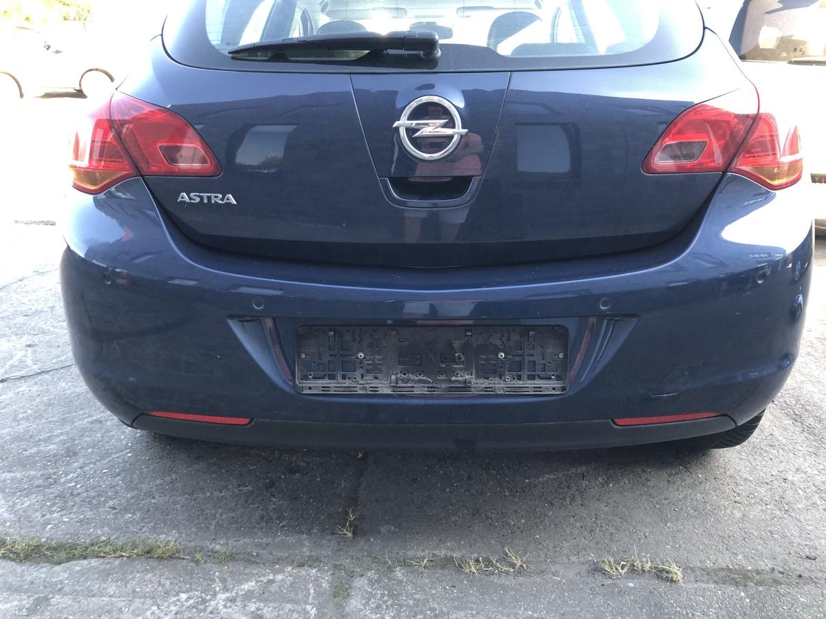 Opel Astra J Stoßfänger hinten Heckschürze mit PDC 5 türer Z22A Waterworld Met