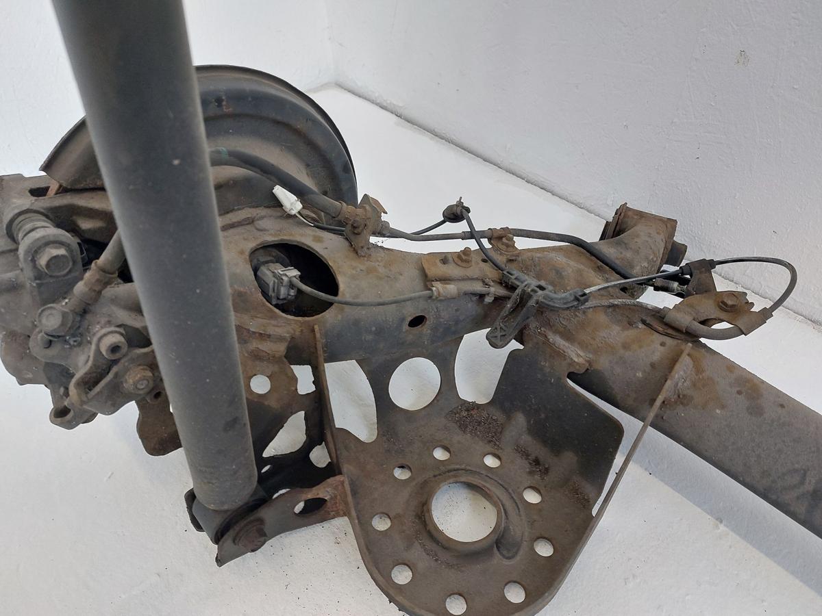 Toyota IQ Typ AJ Hinterachse Achse hinten Achsk&ouml;rper mit Schiebenbremse