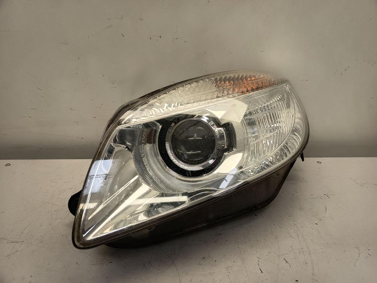 Skoda Fabia II Roomster 5J Hauptscheinwerfer links Halogen Linse Frontlicht
