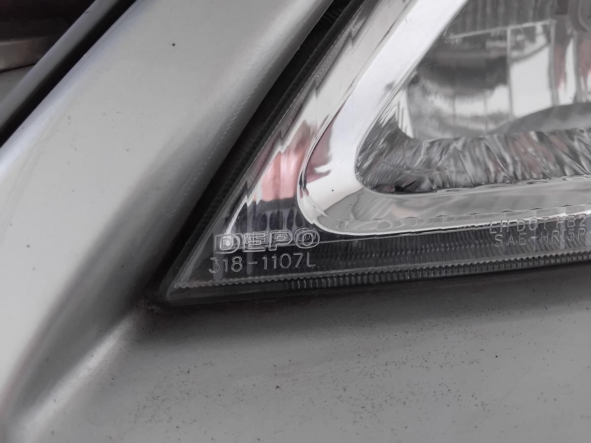 Suzuki Liana Scheinwerfer links Depo Halogen mit LWR BJ2004