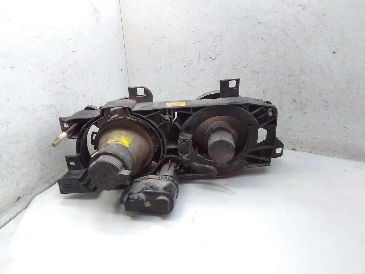 BMW 5er E34 520i Scheinwerfer links mit LWR BJ1991