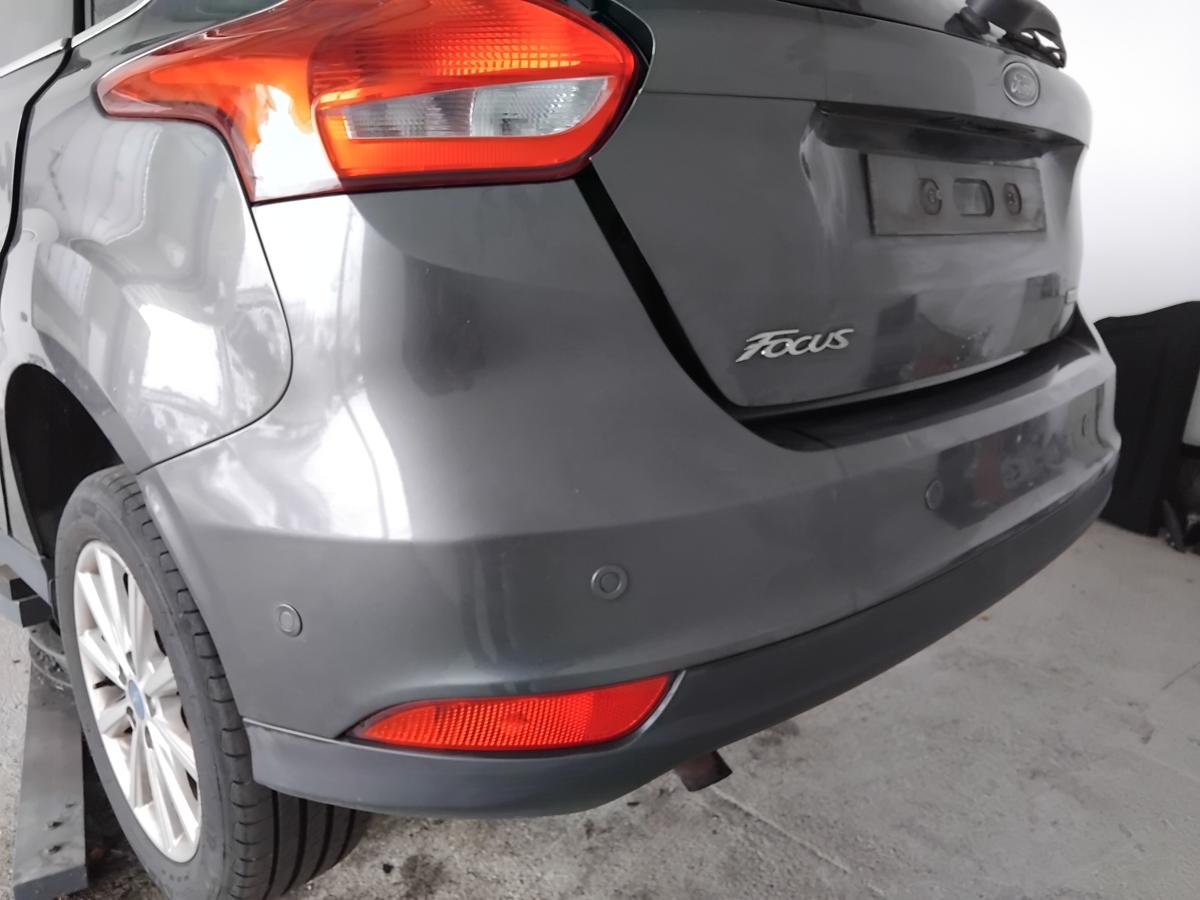 Ford Focus 3 Facelift Flie&szlig;heck orig Stossf&auml;nger hinten mit 6xPDC BJ2015 magneticgrau