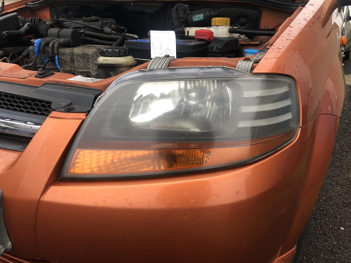 Chevrolet Kalos KLAS Scheinwerfer links Lampe vorn Licht vorn