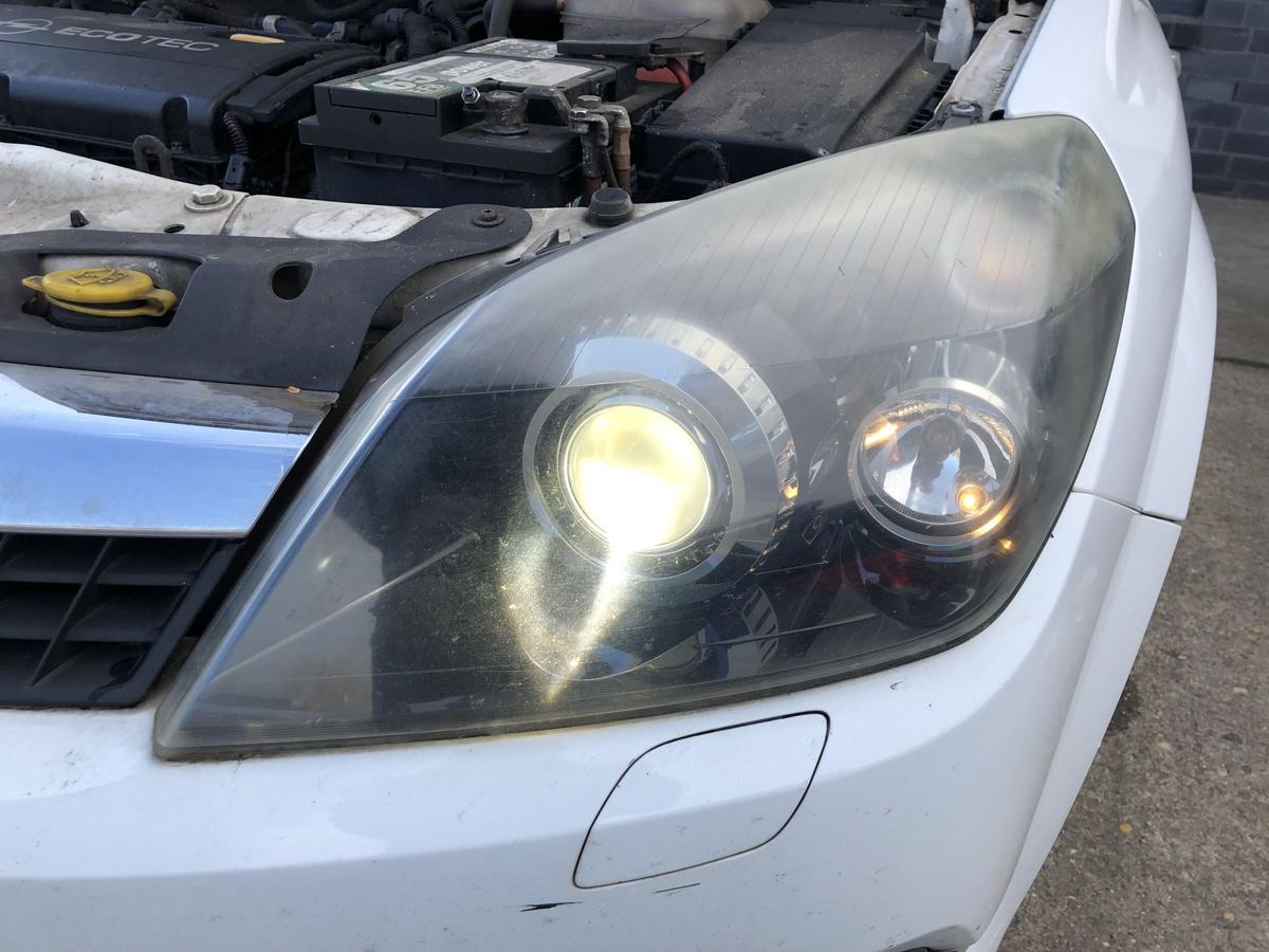 Opel Astra H GTC Scheinwerfer links Xenonscheinwerfer Tr&uuml;b OEM Hella Lampe